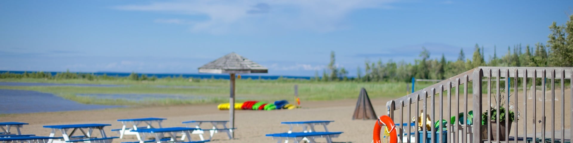 Blue Mountain Beach caracterizando uma praia de areia