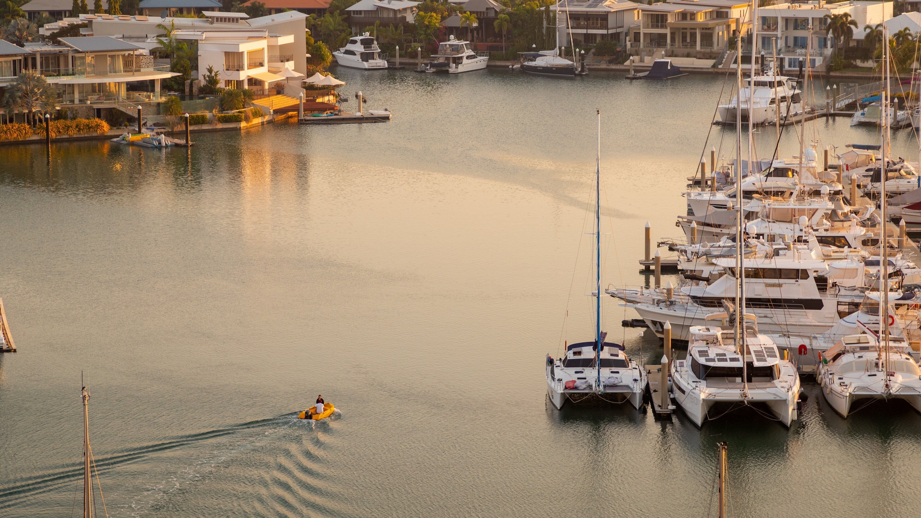 Cullen Bay Marina featuring a bay or harbor, boating and a sunset