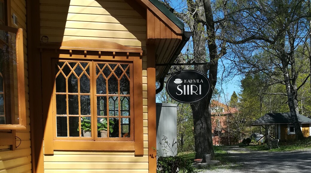 Coffeehouse Siiri is truly hidden gem. You can´t come across by accident. Antique house situated ashore has left behind the new block of bildings during the times . You have to drive through parking space and downhill. You can come by boat #LikeALocal, there is two berth for guests too. https://www.facebook.com/KahvilaSiiri/