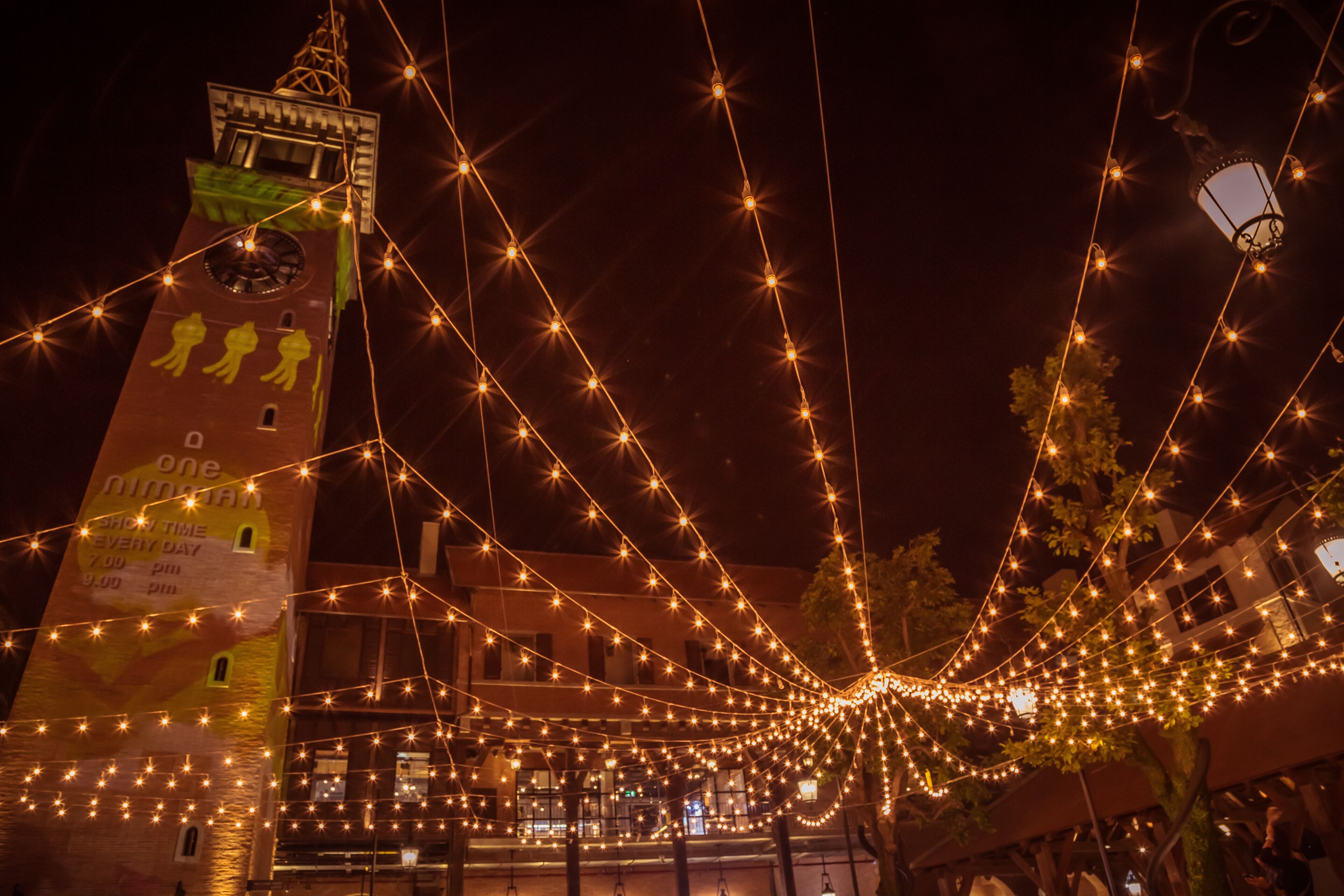 Community mall name "One Nimman" one of new landmark in Chiang Mai province, Thailand with light lamps and Europe tower in the center of meeting point.