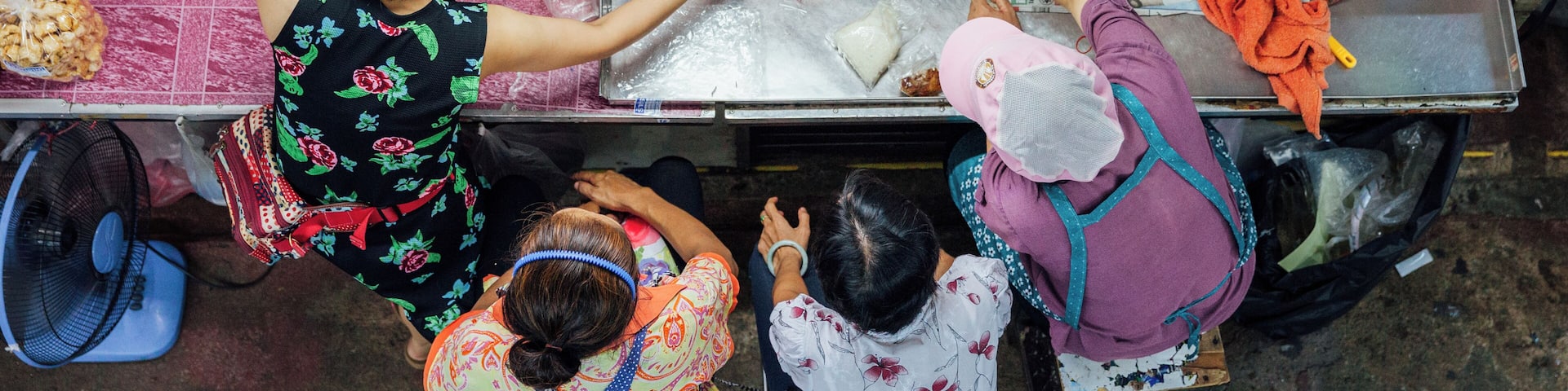 Vendors lunch at Warorot market, Chiang Mai