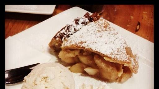 Homemade apple pie with spiced cider ice-cream. Sutton's Cider Factory is just off the highway outside of Stanthorpe with pies, preserves, cider and juice all made from the apple orchard out the back.