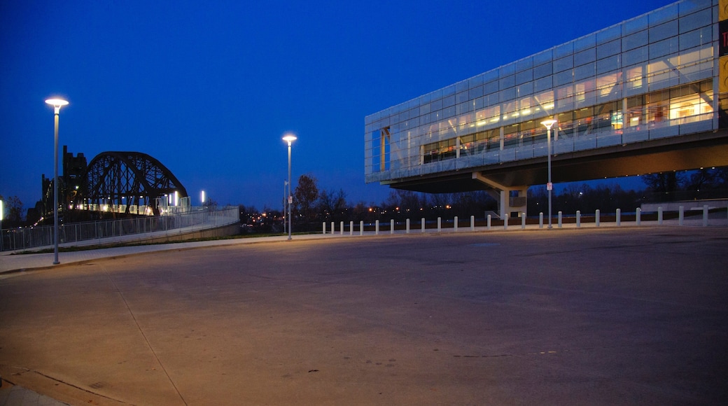 William J. Clinton Presidential Library featuring night scenes, a bridge and modern architecture