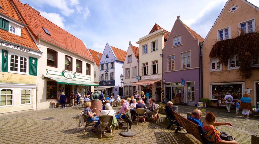 Schnoor som visar ett torg sÄvÀl som en liten grupp av mÀnniskor