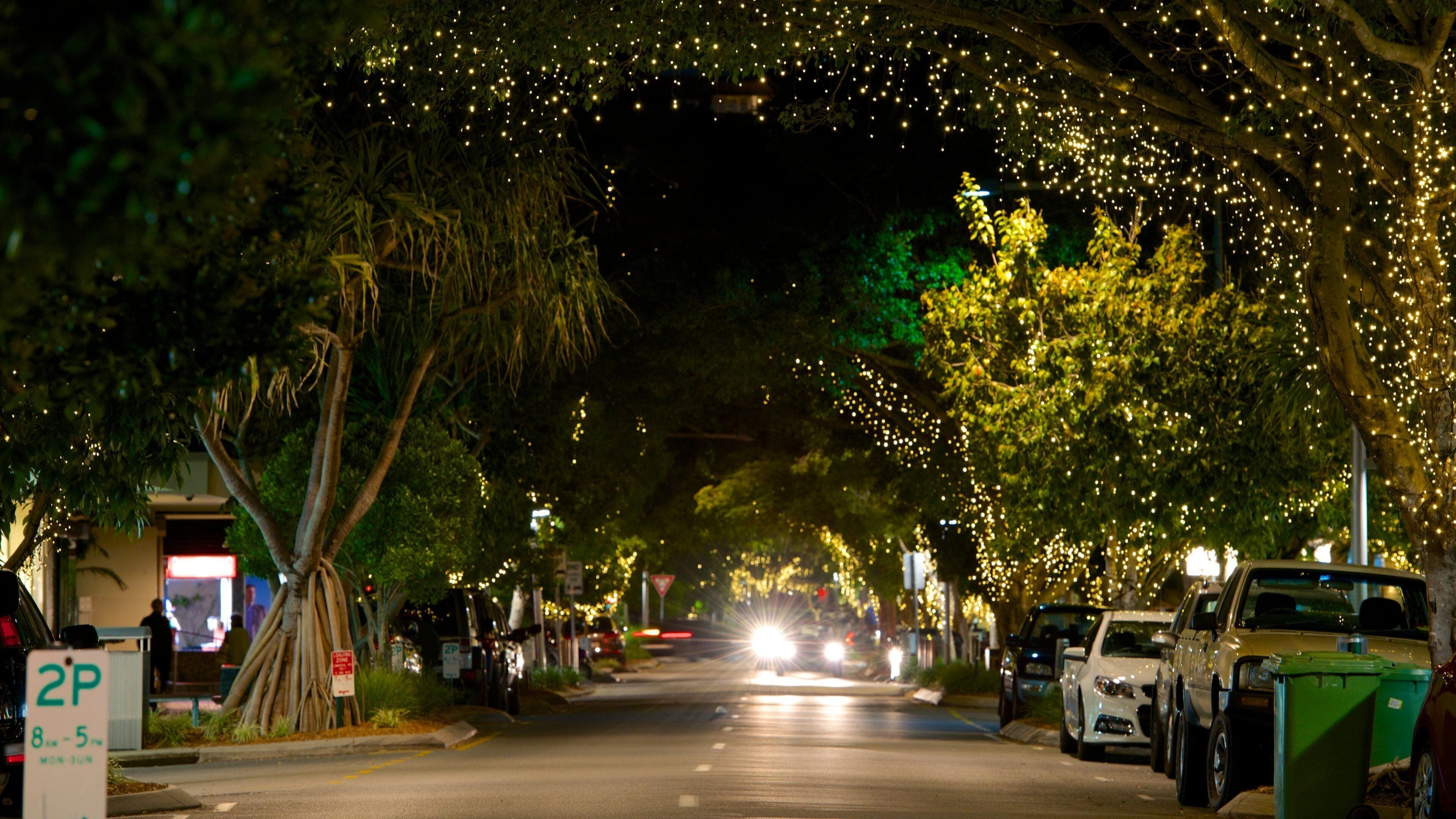 Hastings Street featuring night scenes and street scenes