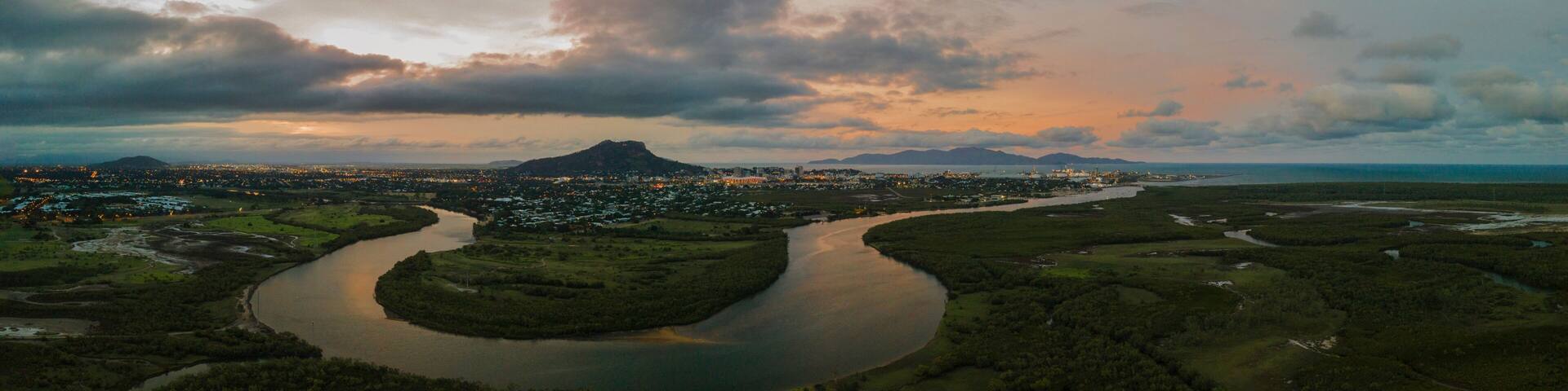 Aerial shot of Townsville and Castle Hill from the south with the winding Ross River in view
