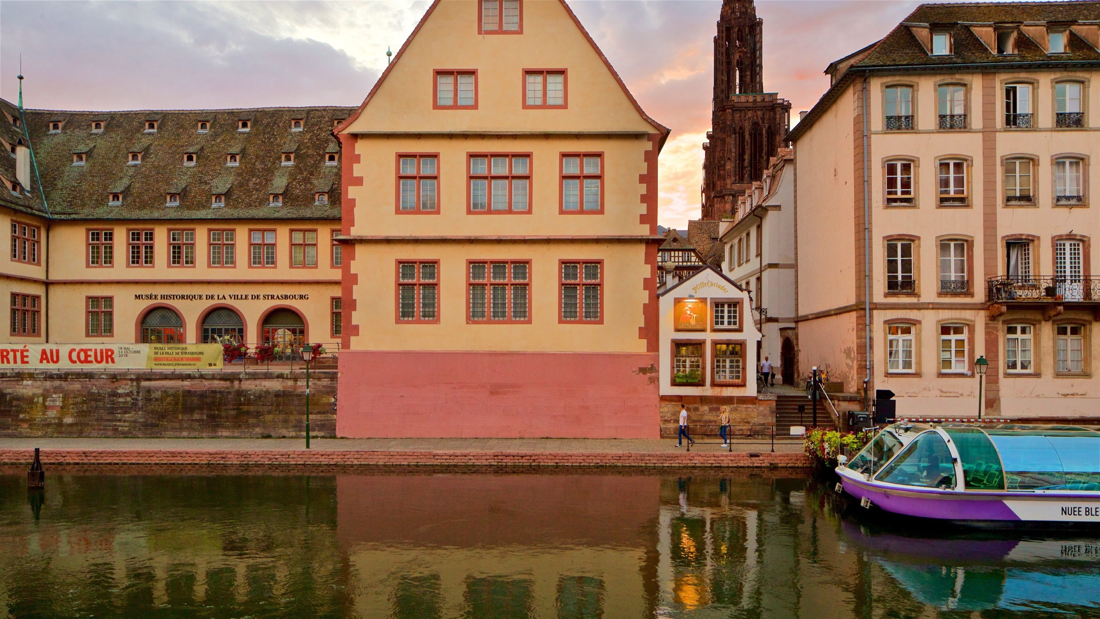 Strasbourg which includes a river or creek, a sunset and a city