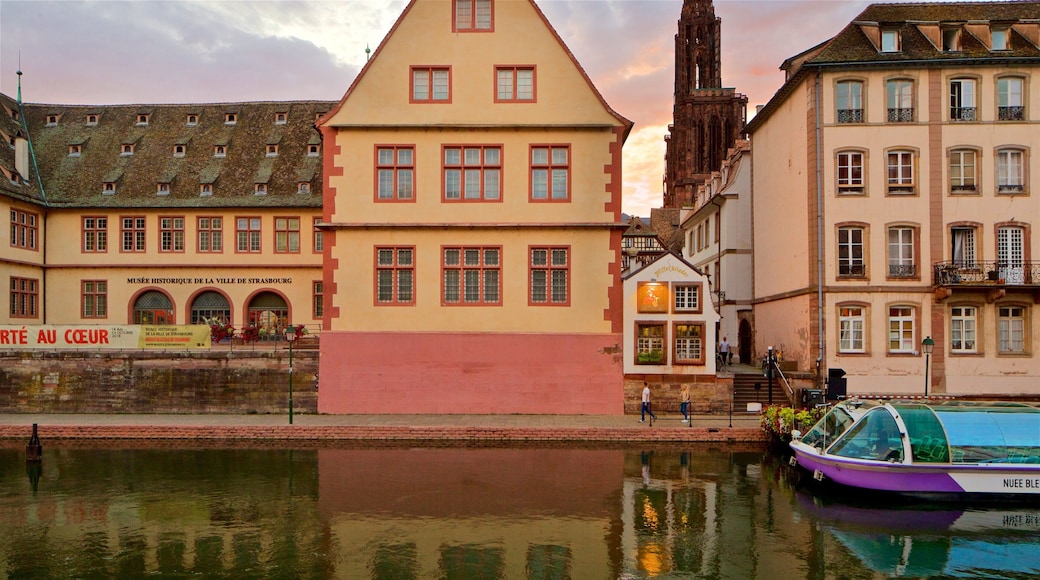 Strasbourg which includes a river or creek, a sunset and a city