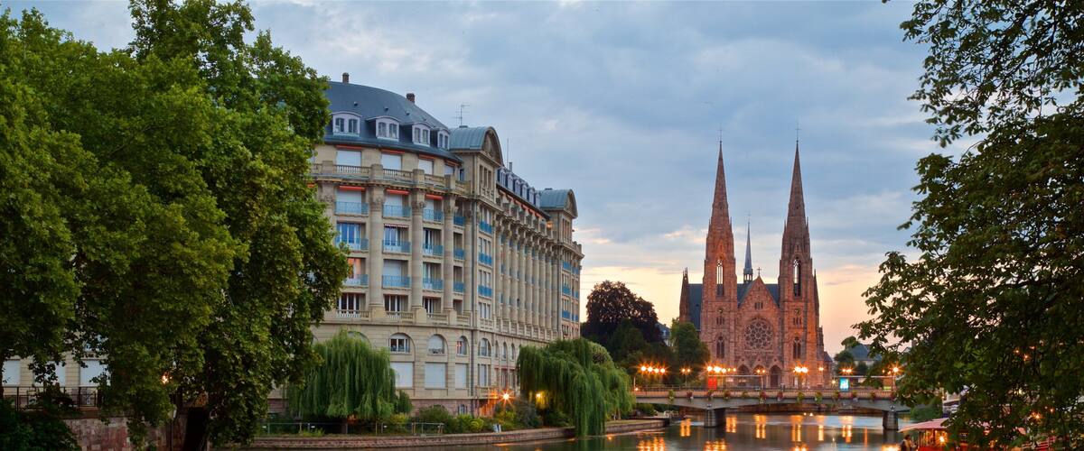 Strasbourg showing a river or creek, heritage architecture and a church or cathedral