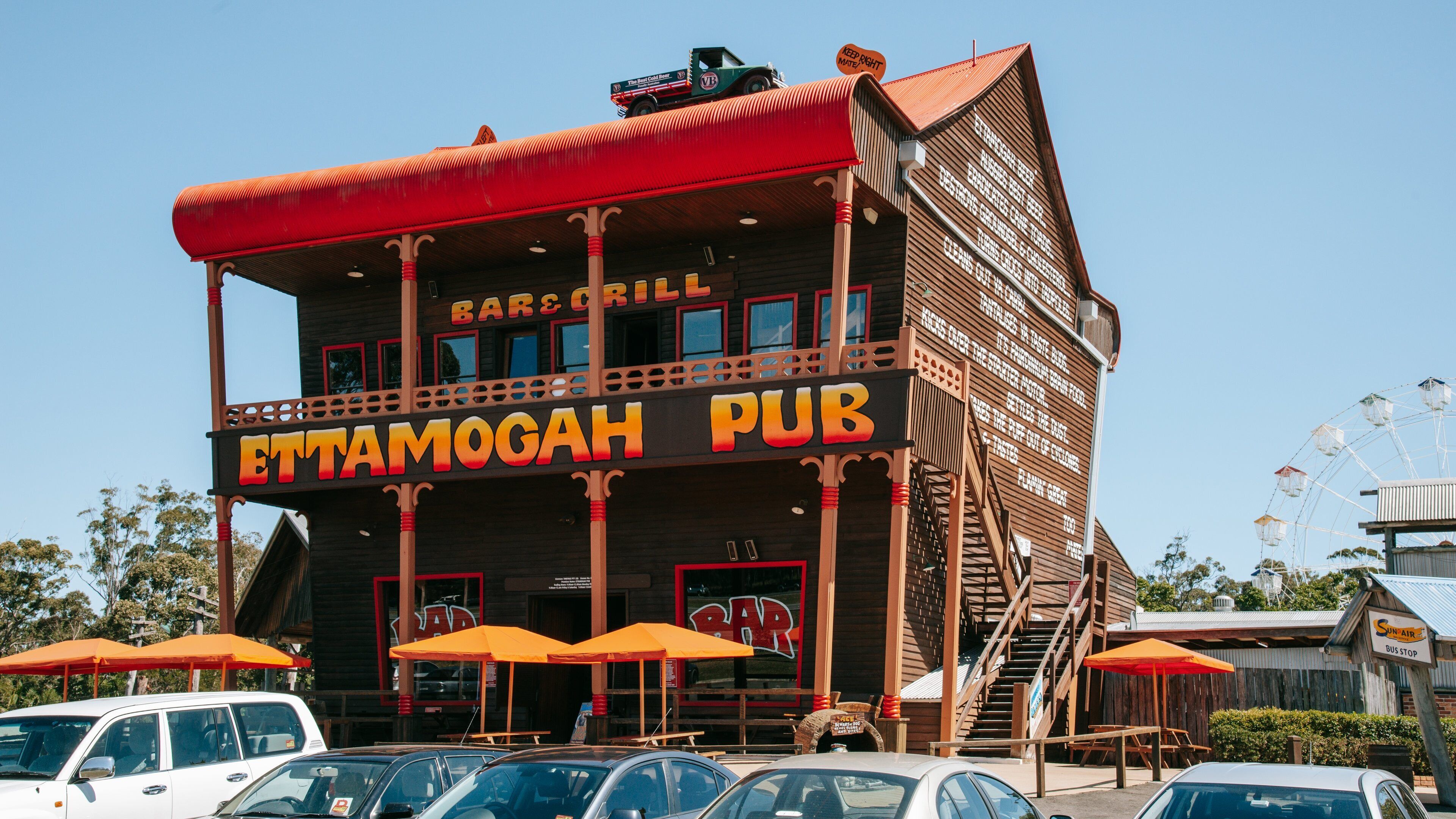 Aussie World featuring signage and a bar