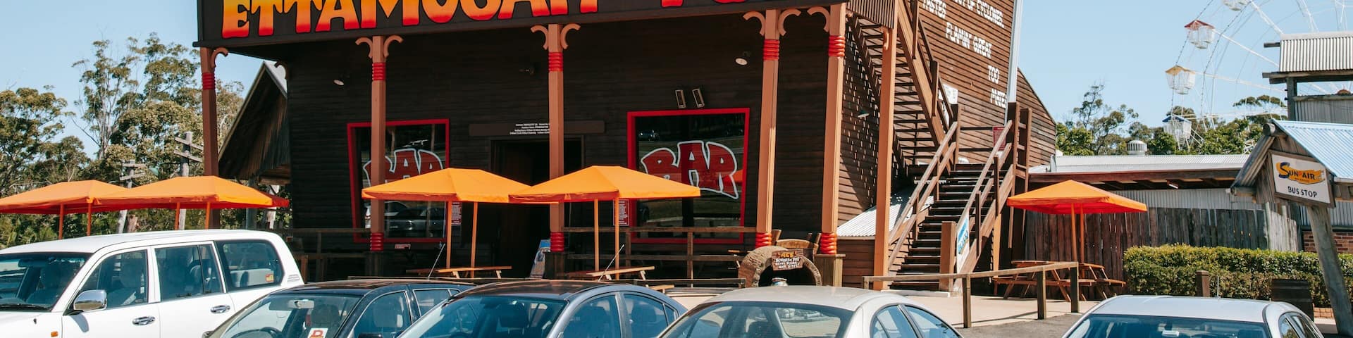 Aussie World featuring signage and a bar