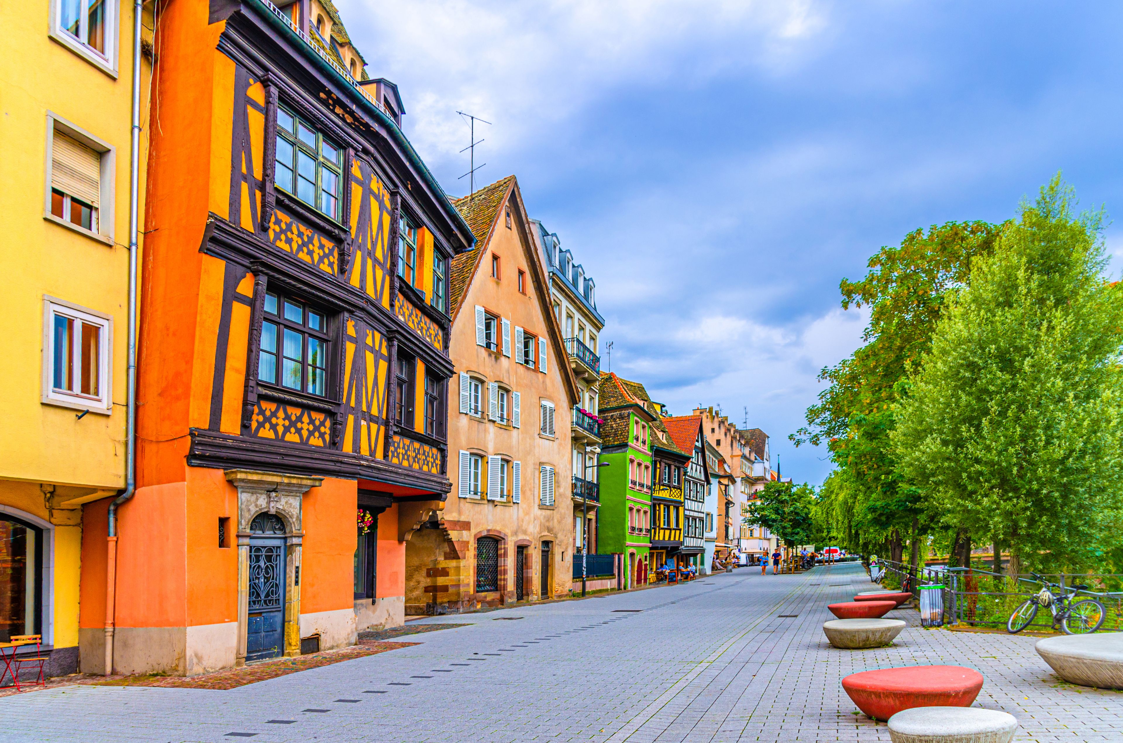 Medieval buildings old colorful houses on Quai des Bateliers embankment in old town Strasbourg city historic Centre Ville Krutenau quarter, Alsace Grand Est region, France