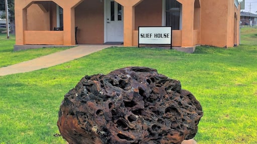 The old Minnie R. Slief Library, now in the City Park, Cheyenne, Oklahoma. The big rock in front is a 1,510 pound fossilized termite nest, at least 4 million years old.
