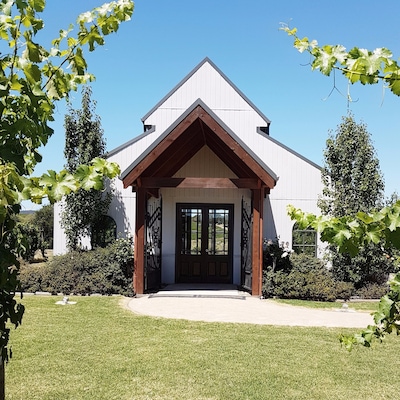 The pitched roof of the chapel rising out of the vines is the first thing you see as you pull into the drive way, suggesting that this is an establishment dedicated to strengthening the journey.  As you wander the gardens with the scent of rose and lavender accompanying you, remember that this property defines the term New Beginnings.  You see, half of the land fell victim to the devastating fires of Black Saturday eight years ago.  So, rising from the ashes and overcoming devastation is now the foundation of this welcoming and romantic destination.  The addition of an outdoor chapel and onsite accommodation ensures that Immerse ticks all the boxes for weddings, conferences and celebrations.
#yarravalley #immerse #weddings #melbourne #australia #foodandwine #green