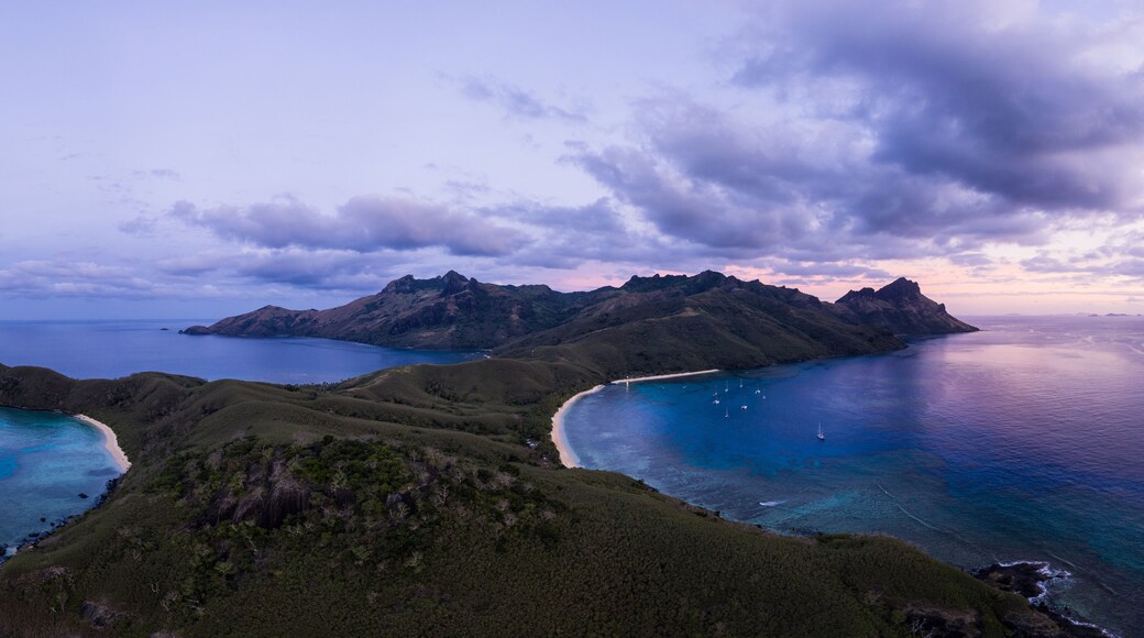 Dramatic aerial panorama of the sunset over the Waya island in the Yasawa group in Fiji