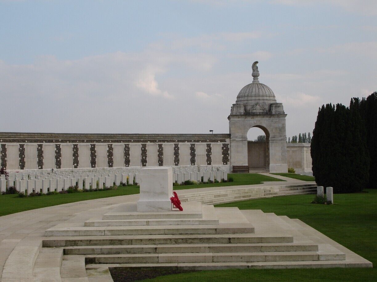 Tyne Cot Commonwealth War Graves Cemetery and Memorial to the Missing is a Commonwealth War Graves Commission (CWGC) burial ground for the dead of the First World War in the Ypres Salient on the Western Front. The cemetery grounds were assigned to the United Kingdom in perpetuity by King Albert I of Belgium in recognition of the sacrifices made by the British Empire in the defence and liberation of Belgium during the war. It is the largest cemetery for Commonwealth forces in the world, for any war. The cemetery and its surrounding memorial are located outside of Passendale, near Zonnebeke in Belgium.
The name "Tyne Cot" is said to come from the Northumberland Fusiliers seeing a resemblance between the German concrete pill boxes, which still stand in the middle of the cemetery, and typical Tyneside workers' cottages – Tyne Cots.