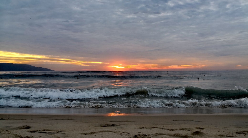 One of the best places to get a sunrise shot is in My Khe Beach.
I went there at 5AM and I was surprised that there were so many people swimming. Don't worry though, My Khe beach is so wide you'd still have so much space despite the crowd.