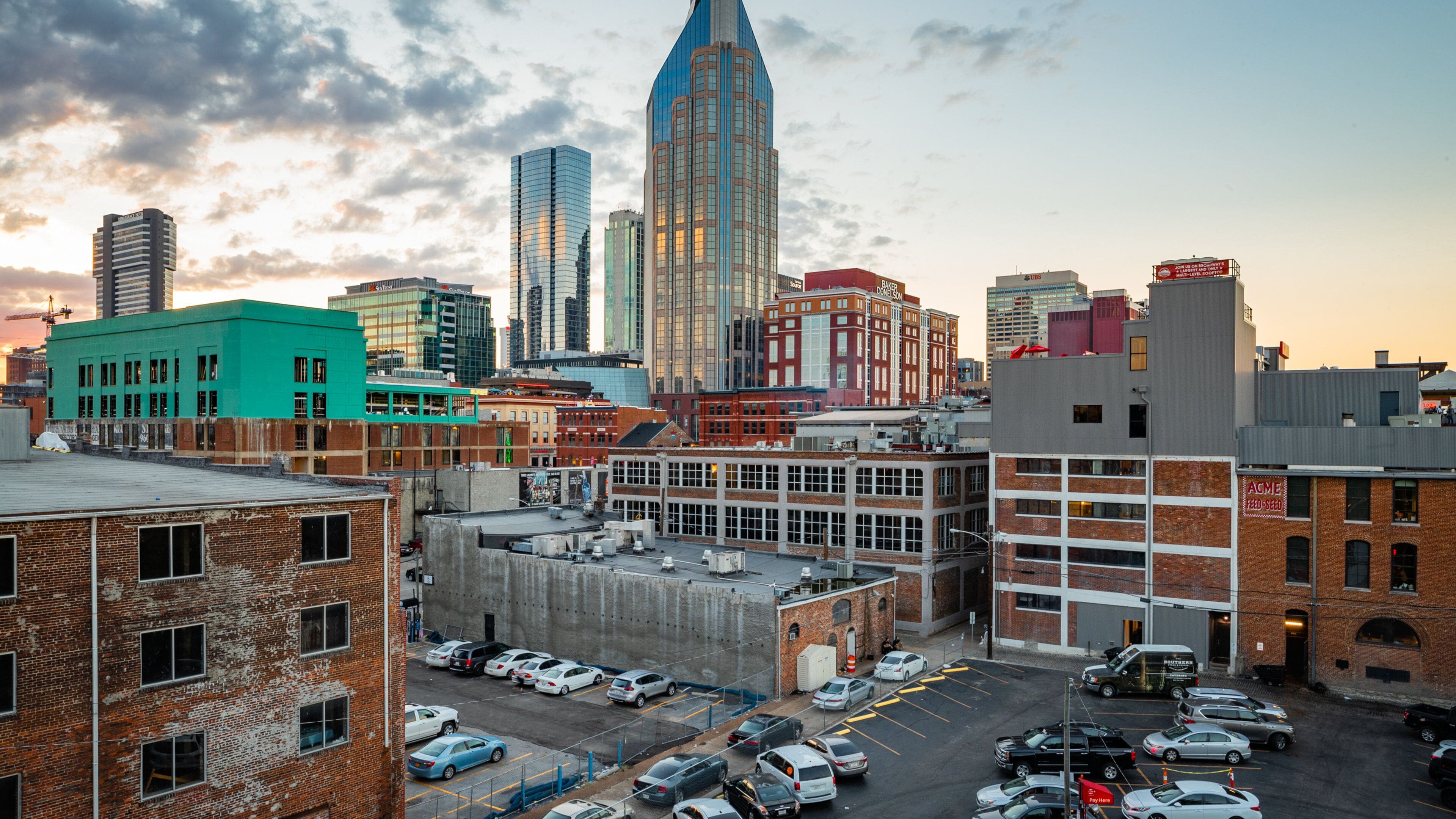 Nashville showing a sunset and a city