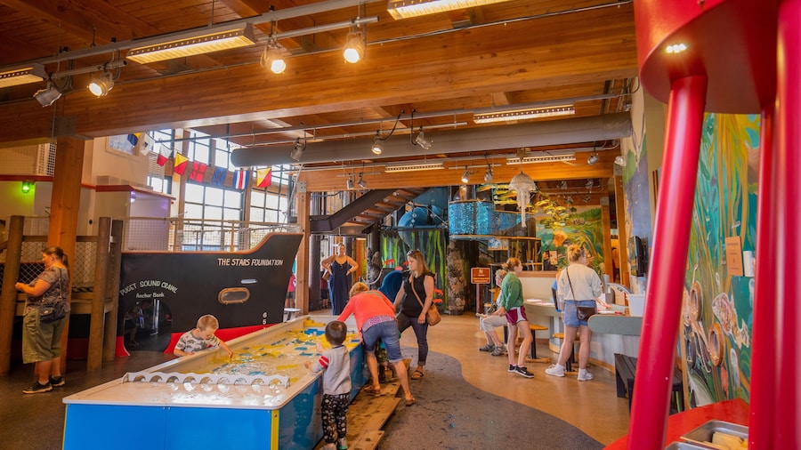 Hands On Children\'s Museum featuring interior views as well as a family