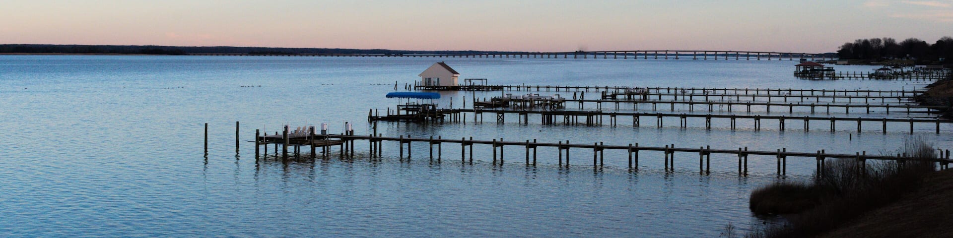 Golden hour view of dock on the Rappahannock River at Sunset