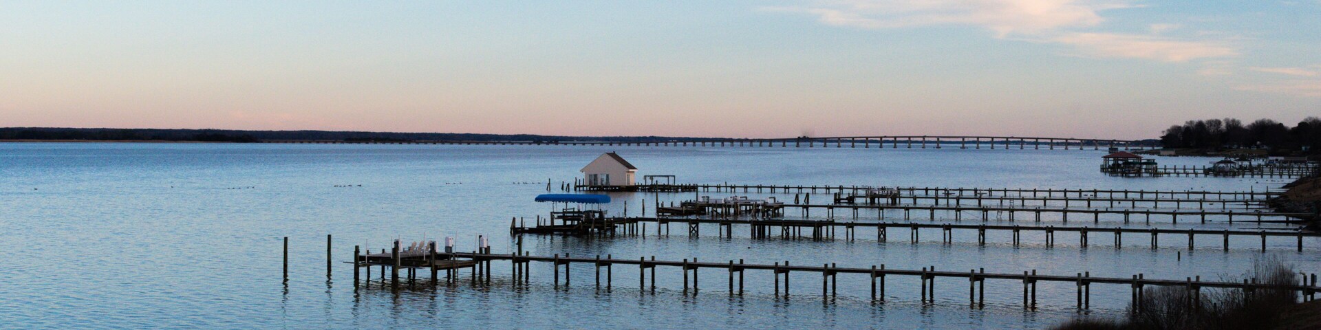 Golden hour view of dock on the Rappahannock River at Sunset