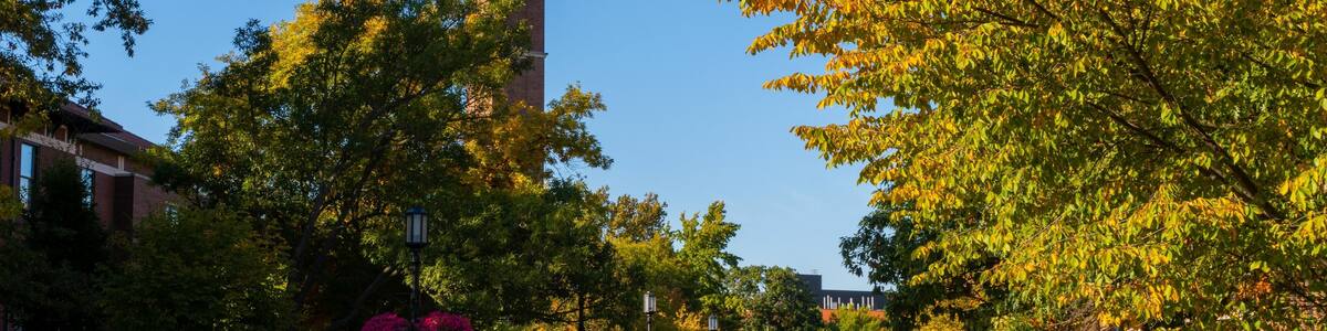 Bell tower surrounded by colorful autumn trees in West Lafayette Campus, Indiana