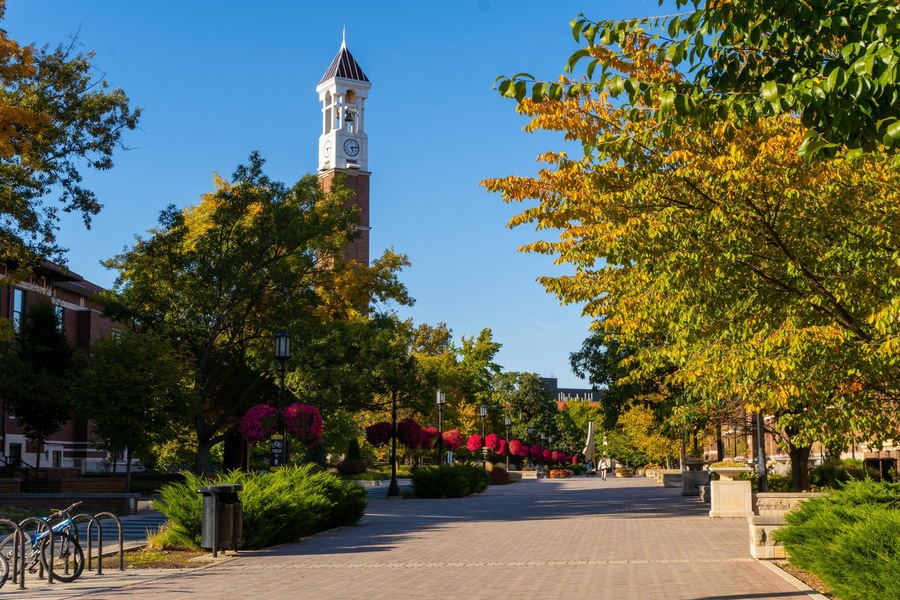 Bell tower surrounded by colorful autumn trees in West Lafayette Campus, Indiana