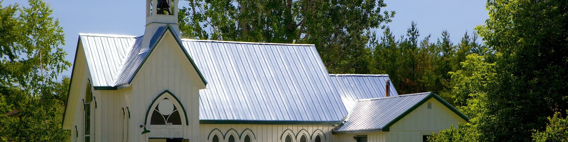 Fanshawe Pioneer Village showing heritage architecture, religious elements and a church or cathedral