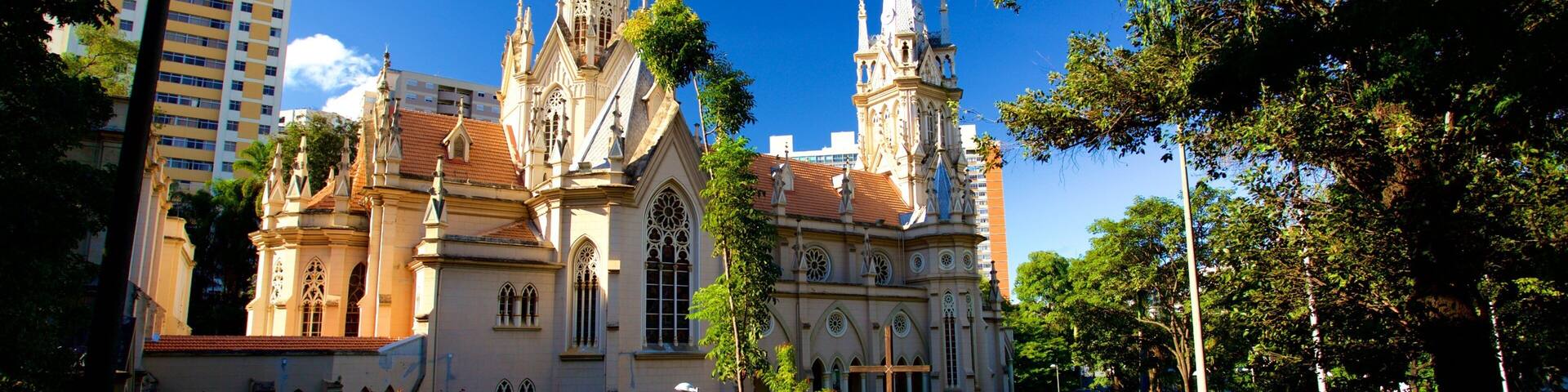 Boa Viagem Cathedral showing a city, a garden and a church or cathedral