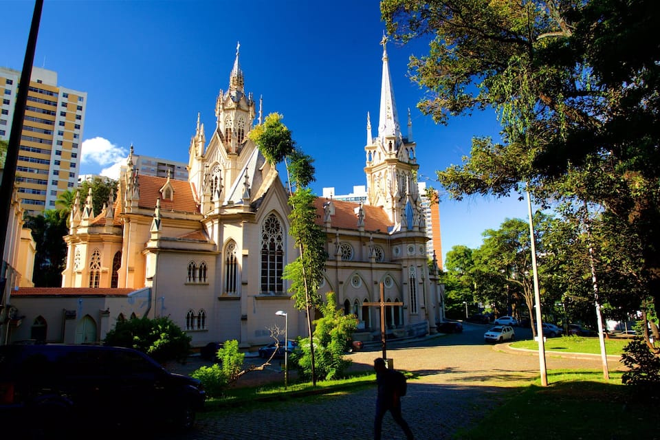 A historic church with ornate spires and a large rose window.