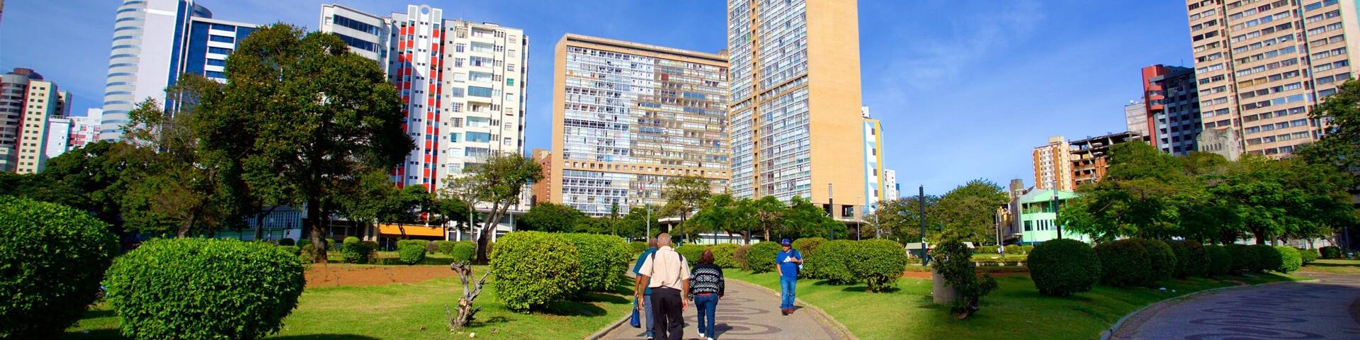 Raul Soares Square showing a city as well as a small group of people