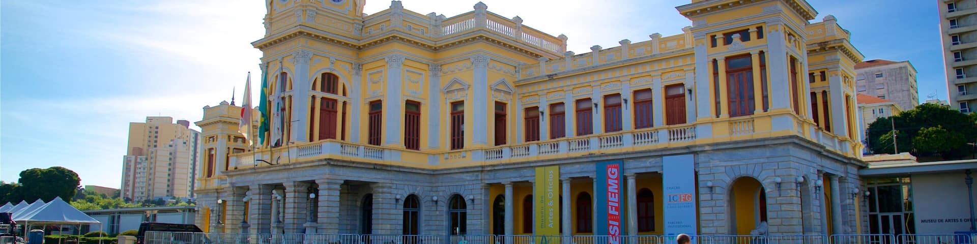 Museum of Arts and Craft showing heritage architecture and a square or plaza as well as an individual male