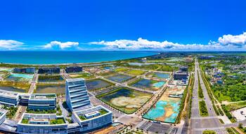 Aerial Panorama of Haikou Jiangdong New District, an International Hub for Retail, Residential, Leisure, Workplace, and Transportation in Hainan Free Trade Zone.