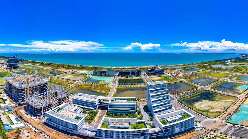 Aerial Panorama of Haikou Jiangdong New District, an International Hub for Retail, Residential, Leisure, Workplace, and Transportation in Hainan Free Trade Zone.