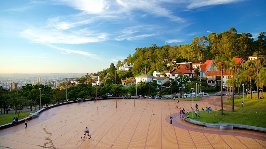 Pope\'s Square featuring a park as well as a small group of people