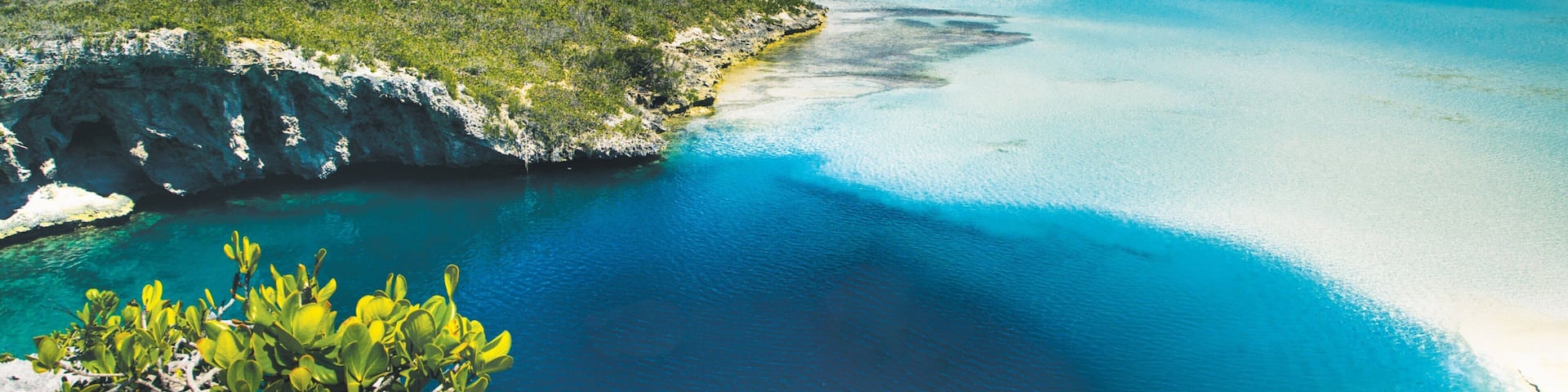 Dean\'s Blue Hole showing rugged coastline, general coastal views and tropical scenes