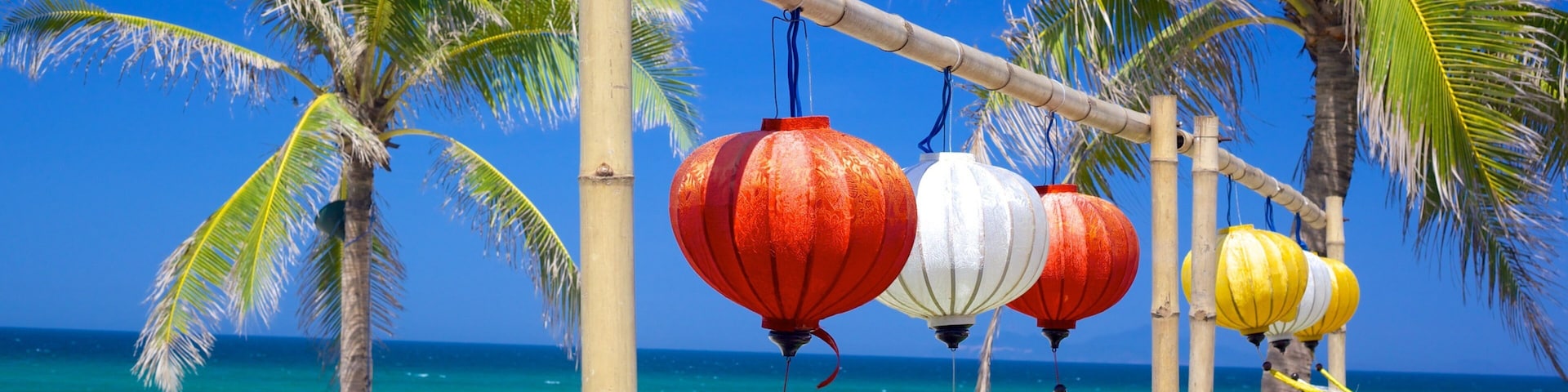 Praia Non Nuoc mostrando cenas tropicais e uma praia de areia