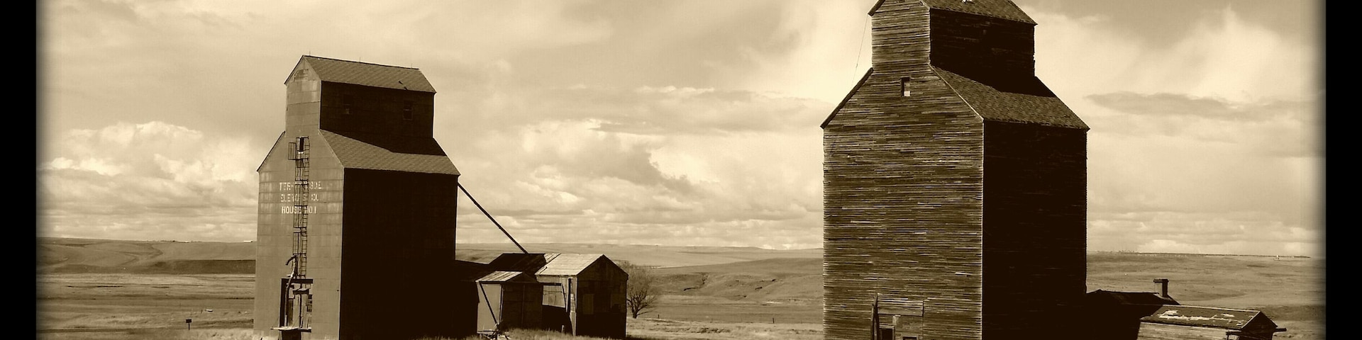 Old grain silos standing the tests of time for a railroad that no longer exists.