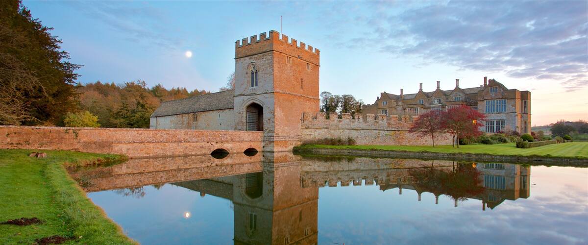 Broughton Castle which includes heritage architecture, a lake or waterhole and château or palace
