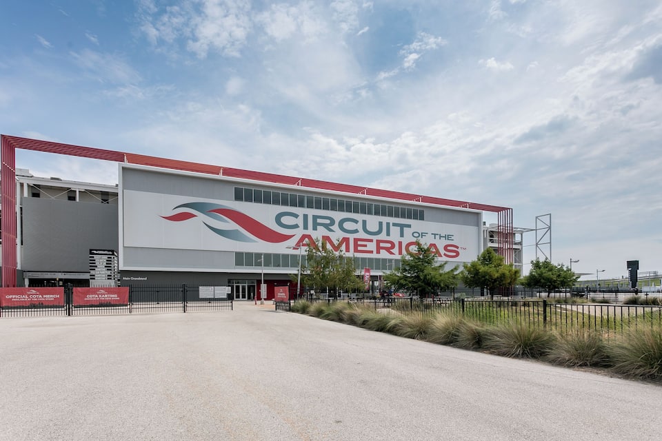 A large building with the sign "Circuit of the Americas".