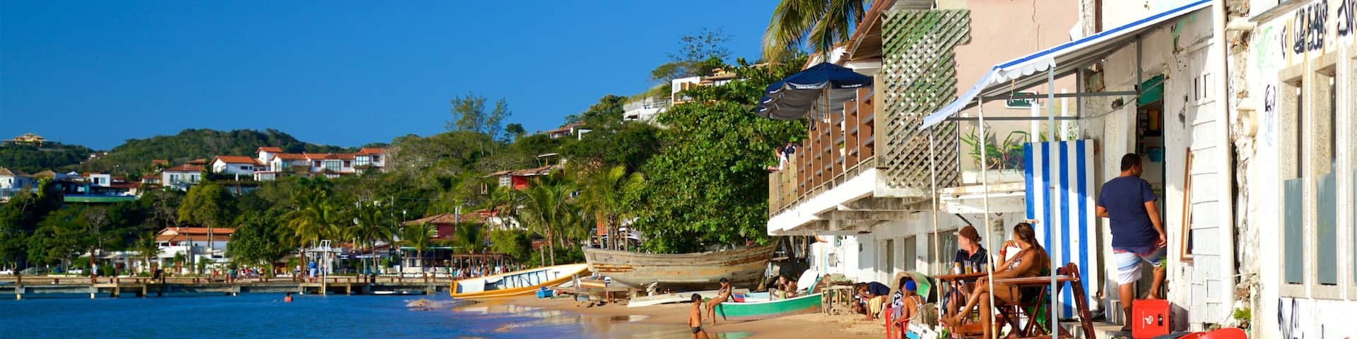 Canto Beach which includes general coastal views, a coastal town and a sandy beach