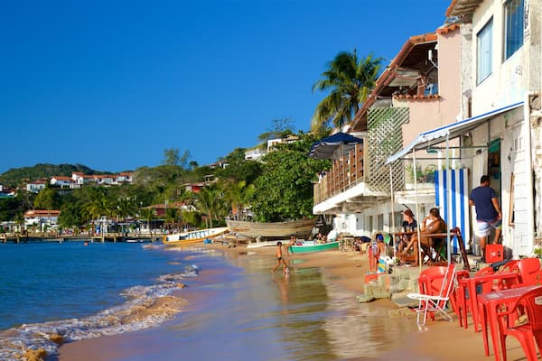 Canto Beach which includes general coastal views, a coastal town and a sandy beach