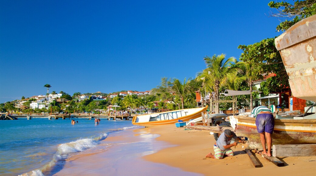 Canto Beach showing a coastal town, a sandy beach and general coastal views