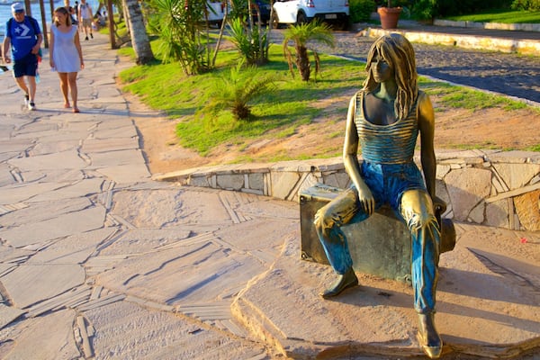 Brigitte Bardot Statue which includes outdoor art and a statue or sculpture as well as a couple