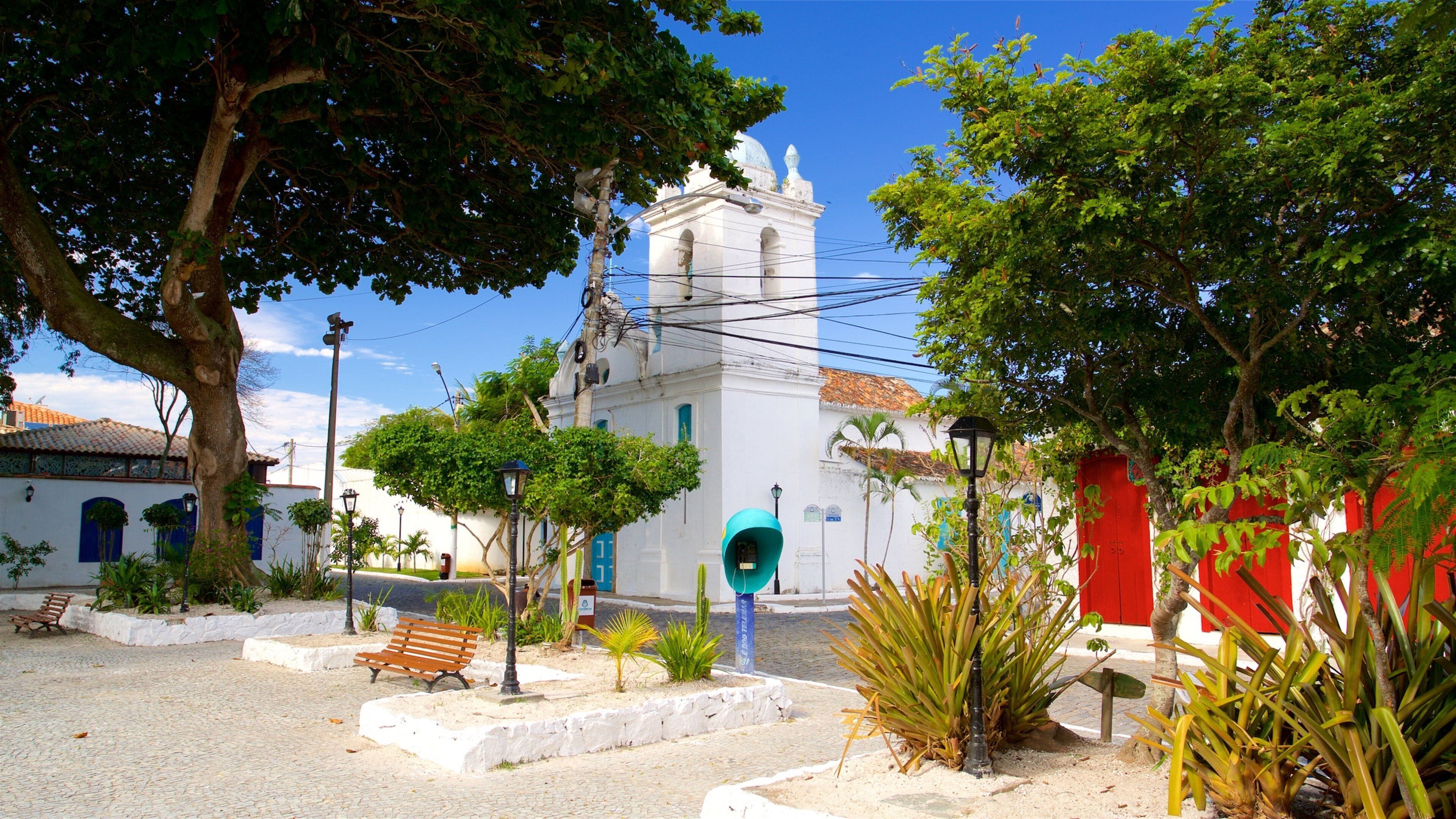 Sao Benedito Church which includes a small town or village and a church or cathedral