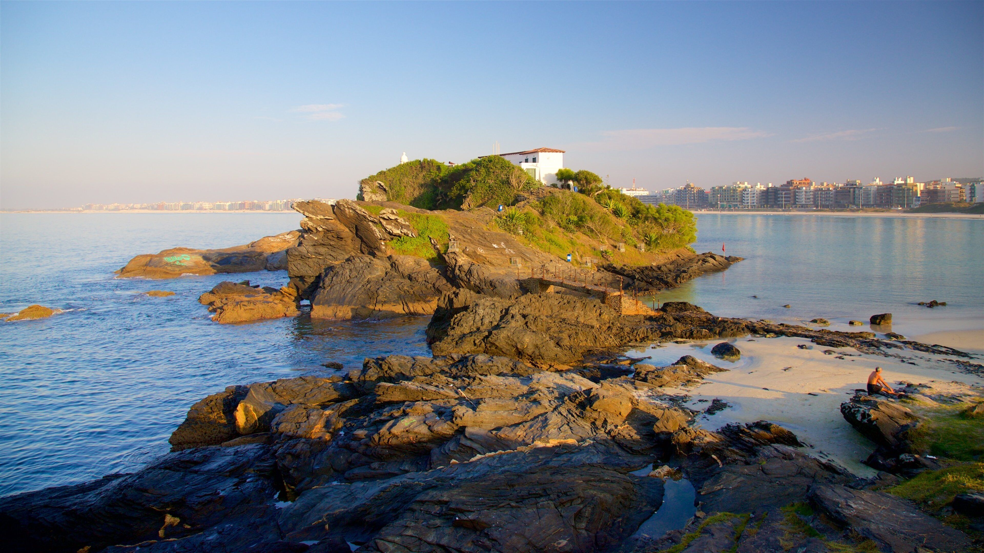 Sao Mateus Fort which includes general coastal views, a coastal town and a sunset