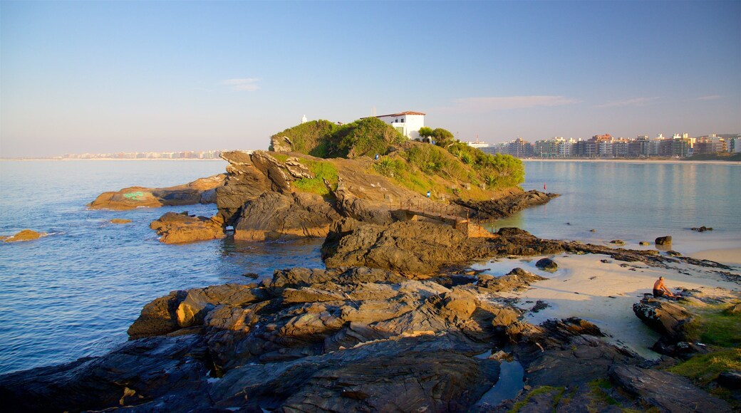 Sao Mateus Fort which includes general coastal views, a coastal town and a sunset