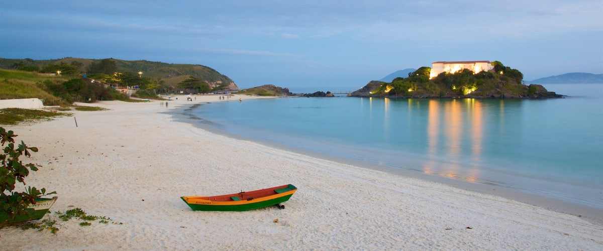 Sao Mateus Fort showing island views, a sandy beach and general coastal views