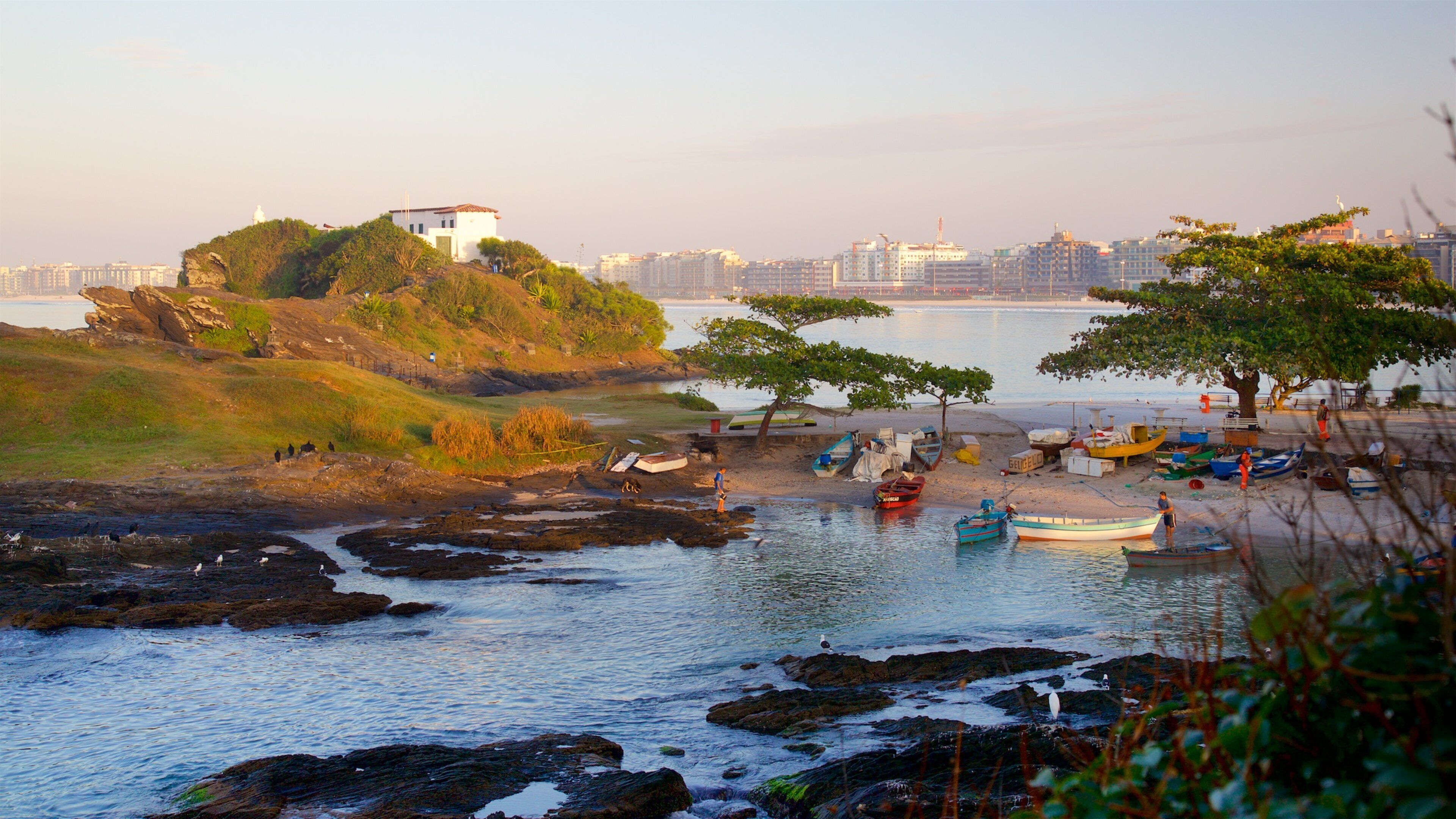 Sao Mateus Fort which includes general coastal views, a sunset and a coastal town