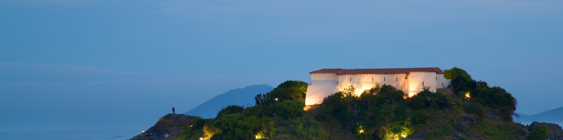 Sao Mateus Fort which includes island views and night scenes